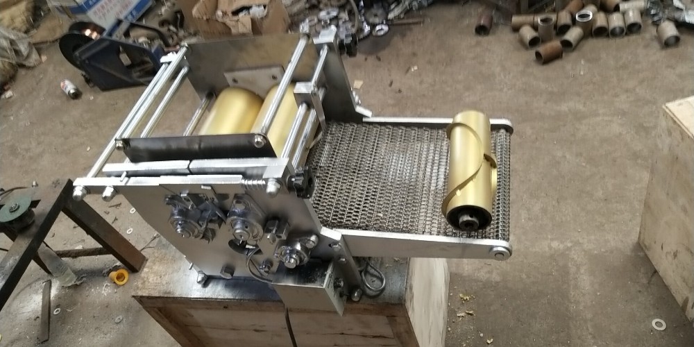 small tortilla machine making