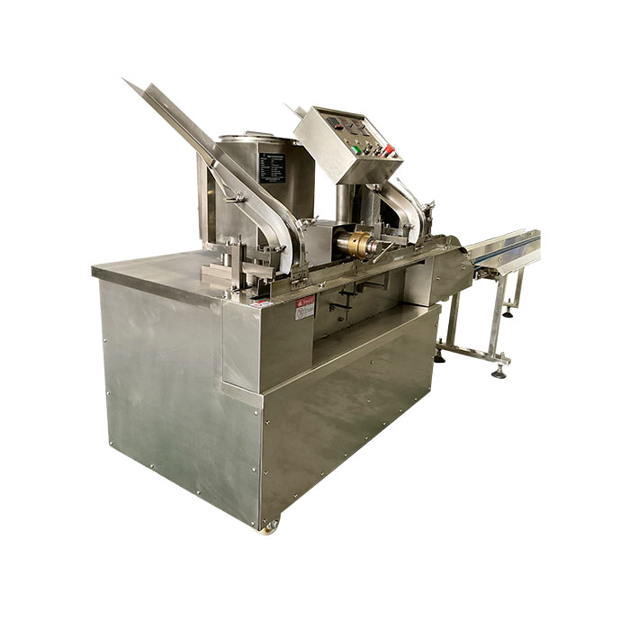 Sandwich biscuit machine